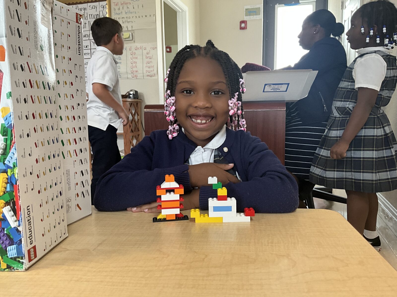 Student coding during an after-school robotics session